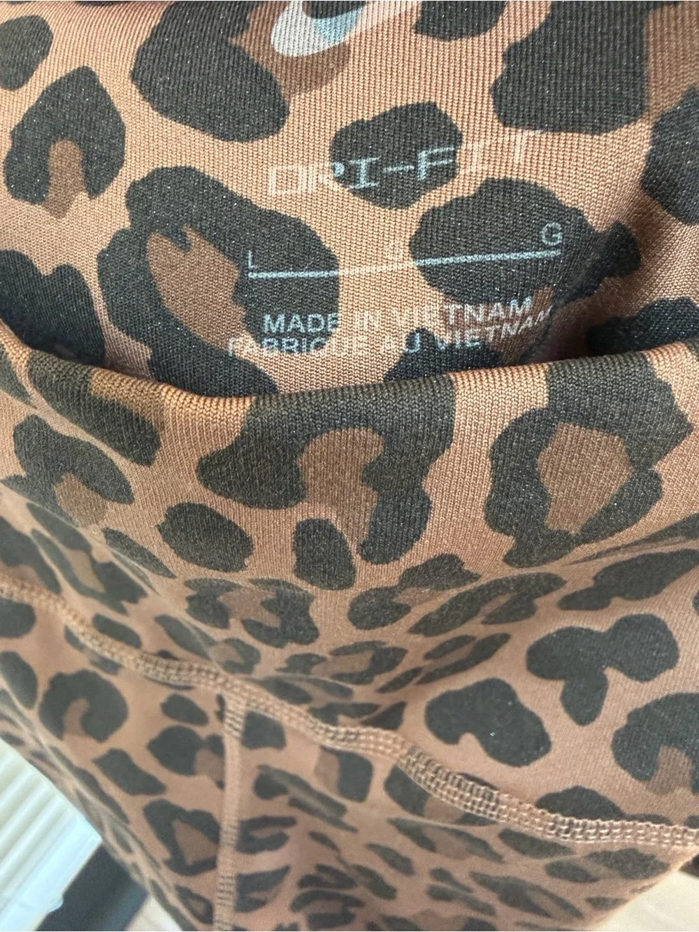 Nike Dri Fit Leopard Print Leggings with faint sparkle